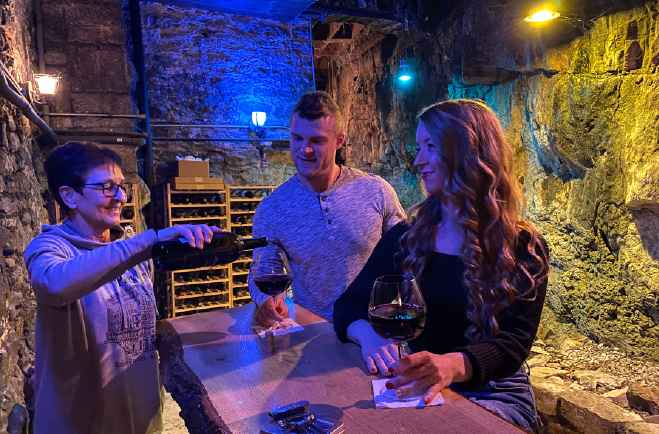 Couple enjoying wine tasting at the Basin Park Hotel